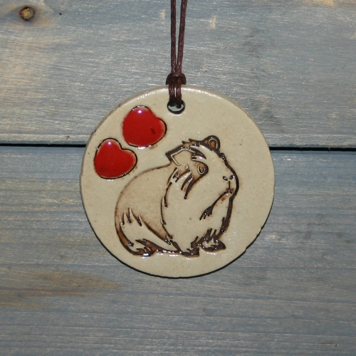 Anhänger und Duftstein in einem mit Meerschweinchenmotiv